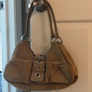 Suede Prada handbag  with silver buckle .